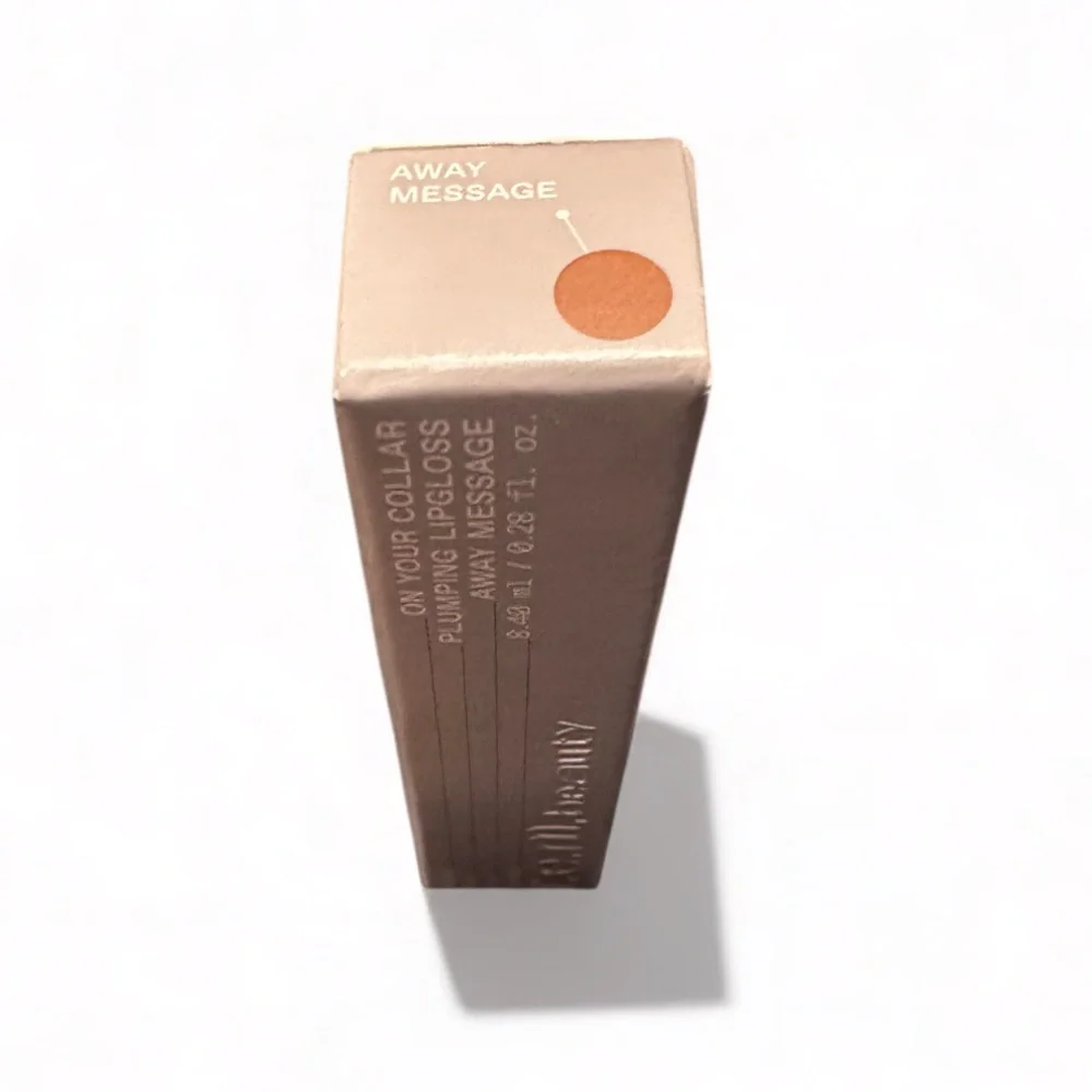 r.e.m. beauty On Your Collar Plumping Lipgloss in shade Away Message